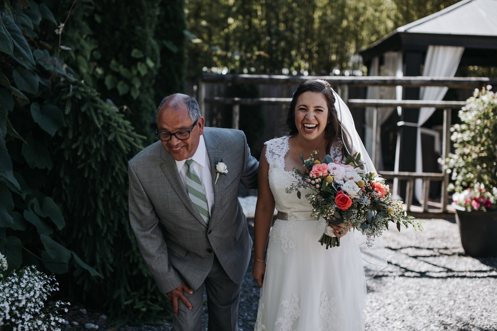 bride_laughing_with_father