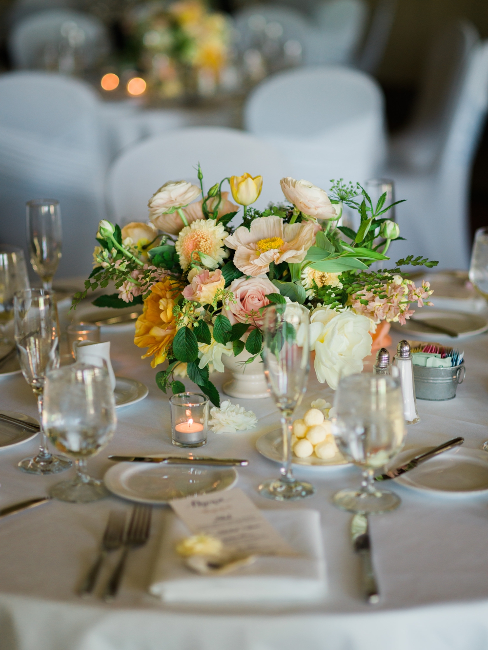 yellow-and-pink-flowers-on-tables