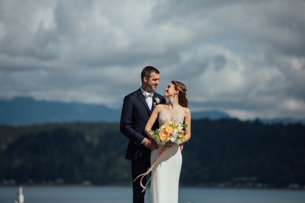 bride-and-groom-on-dock-at-alderbrook