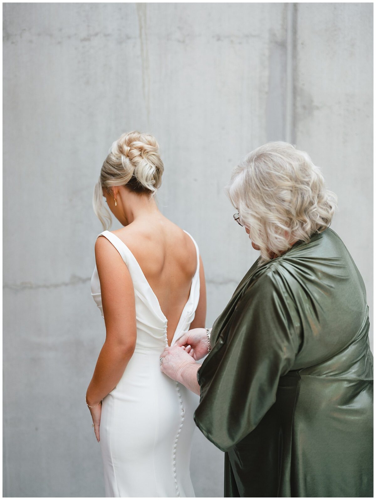 bride getting dressed 